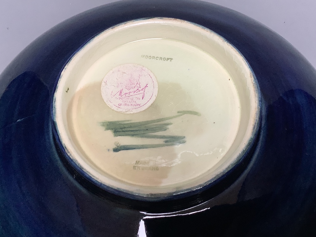 A green Moorcroft hibiscus bowl, diameter 26cm